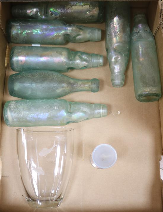 A collection of iridescent bottles, Penny Lick and an Arts & crafts vase
